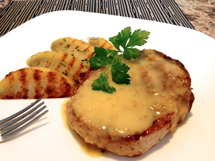 Receta Cerdo al Horno con Patatas: Plato Tradicional Fácil y Delicioso