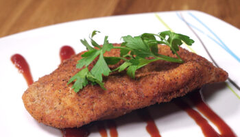 Receta Pechugas de Pollo Empanadas con Ajo y Perejil: Crujientes, Aromáticas y Fáciles de Preparar